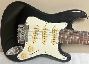 lot 61 image: Mini Lotus Electric Guitar