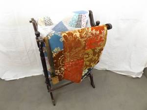 2 Hand Stitched Patchwork Quilts on a Wood Blanket Rack
