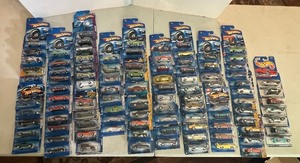 lot 23 image: Huge lot of New Hot Wheels in Blister packs.