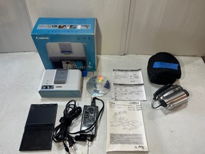 lot 15 image: Canon Selphy Compact Photo Printer, CD1016 Panasonic 30X Digital Zoom Camera PV-GS36
