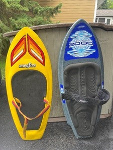 lot 12 image: (2) Kneeboards OBrien Tournament 2000 and Hydro Slide. Measures 21 x 55.
