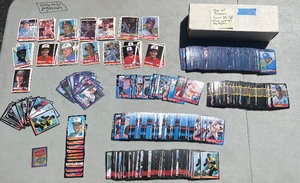 lot 40 image: Box of Baseball Rookie Cards from 1984-1988. There are multiple cards of the same player.