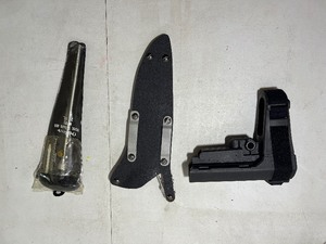 lot 55 image: Knife holster.  SB AR tactical brace. Guters Pistol Cleaning Rod