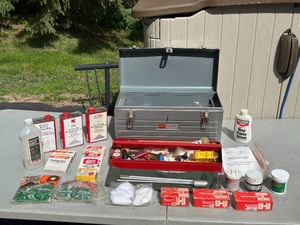 lot 6 image: Toolbox full of gun supplies, Bullets, Gun Powder, Primers, Gun cleaning and much more.  Toolbox included