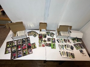 lot 66 image: Group of 2001-2002 Golf cards each box contains some Tiger Woods