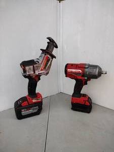 lot 228 image: Milwaukee  square-ring impact wrench 2767-20 w battery Milwaukee Hackzall Reciprocating Saw 2719-20 with battery.