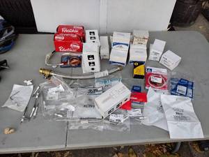 lot 229 image: HVAC Parts Contactor, Relays, Gas Furnace Thermostats, Ignitors, Sensors, Millivolt Generator, Blade fuses, Run capacitor, Water Heater Connector