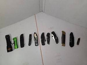 lot 215 image: (8) Pocket knives and (3) small flashlights