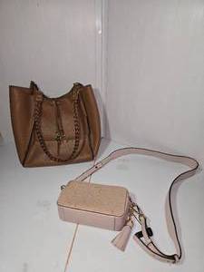 lot 235 image: Michael Kors pink crossbody bag.  Calvin Klein Boho Satchel purse with 11 defined braided handles.