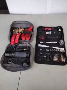 lot 249 image: Apollo Auto Tool Kit and Ratchet Strap kit with Gerber folding knife, Guideman Flashlight, J5 Tactical flashlight