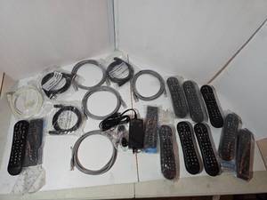 lot 244 image: Lot of Xfinity remotes And HDMI cords, some new in package