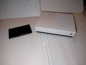 lot 262 image: Nintendo switch and Xbox One S All Digital Edition