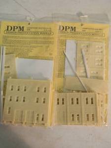 lot 13 image: DESIGN PRESERVATION MODELS N SCALE DPM GOODNIGHT MATTRESS CO. #505 & GROPPS LUGGAGE MFG. #506 - NEW IN PACKAGE - FANTASTIC SET - SEE PICTURES