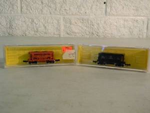 lot 22 image: ATLAS N Scale 70-TON ORE CAR MINN. SMELTING #3203 & 70-TON ORE CAR MISSABE IRON #3221 - IN CASE - NICE - GREAT SET - SEE PICTURES