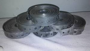 Vintage Galvanized Plumbing Strap and Porcelain White Bathroom Fixtures.