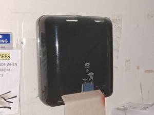 lot 321 image: Tork Intuition Paper Towel Dispenser
