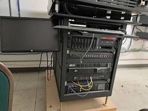 lot 67 image: Server Tower with Tripplite Powerstrip, HP 20 Monitor, Keyboard & Mouse