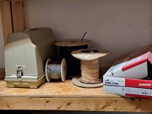 lot 229 image: Contents of Shelf - Sears Kenmore Sewing Machine, Spools of Wire, Plug-ins