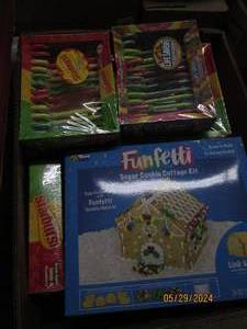 box of candy canes and funfetti sugar cookie cottage kits Best by 022025