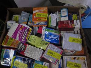 box of medicine and more some in date some out of date