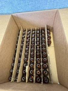 lot 31 image: 70 - 30ml Amber Glass Bottles