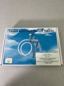 lot 67 image: Vacuum Pump Hand Operated With Meter