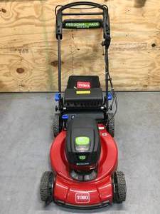 lot 4 image: Toro 60V Max 22 in. Recycler wPersonal Pace & SmartStow Lawn Mower With 6Ah Battery And Charger Model # 21466