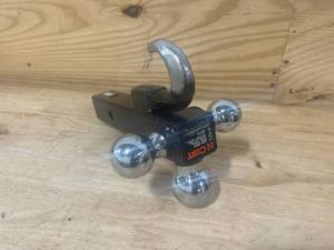 lot 84 image: CURT 45675 Multi-Ball Trailer Hitch Ball Mount, 1-78, 2, 2-516-Inch Balls and Tow Hook, Fits 2-Inch Receiver, 10,000 lbs (Retails for $73.99)