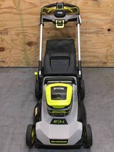 lot 9 image: Used RYOBI 21 Cordless Battery Walk Behind Self-Propelled Mower With 6Ah Battery And Charger Model # RY401014US (Tested And Works)