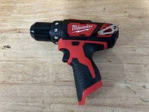 lot 114 image: MILWAUKEE M12 12V Lithium-Ion Cordless 38 in. DrillDriver (Tool-Only) (retails for $89)