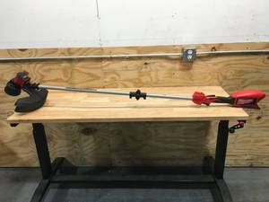 lot 128 image: Used Milwaukee M18 Brushless String Trimmer Model # 2828-20 (Tested And Works) (Tool-Only)