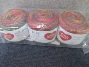 lot 39 image: Red Heart Roll with It Melange Catw...