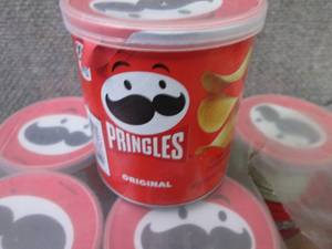 lot 109 image: 12- 1.3 oz Pringles Original...