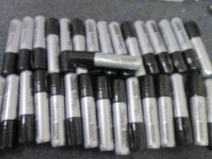 lot 134 image: 32 Black Sharpie Magnum...
