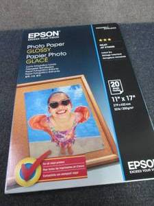 lot 143 image: Epson 11x17 inch Glossy Photo Paper...