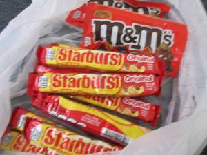 lot 385 image: 10- 2.07 oz Starburst, 2 M&Ms...
