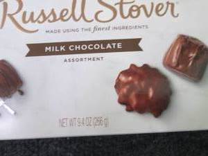 lot 424 image: 3- 9.4 oz Russell Stover Milk Choco...