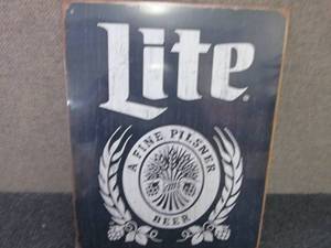 lot 523 image: Metal Miller Lite Sign 12.5x16 inch...