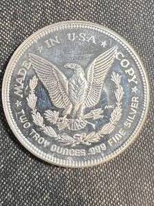 2 TROY OZ .999 FINE SILVER 1987 MORGAN DOLLAR DESIGNED ROUND