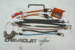 Bungee cords new and old, small wrenches and sockets, and more