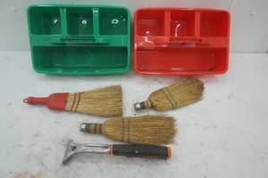 Two caddy organizers and brooms