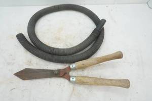 Hedge Trimmers and a black hose