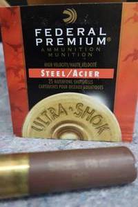 lot 27 image: NEW BOX 10 GA ULTRA SHOK STEELACIER SHOTSHELLS