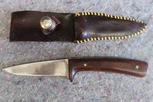 lot 67 image: KNIFE WITH SHEATH.