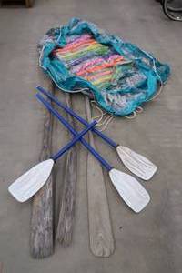 lot 115 image: VINTAGE OARS, PLASTIC OARS AND A FLOATIE
