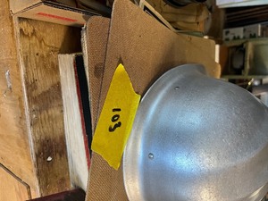 Books, oil can, car manuals