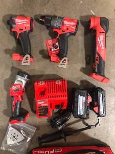 Milwaukee 3698-24MT M18 FUEL 4-Tool Combo Kit, Hammer, Impact, Multi-Tool, Light Customer Returns See Pictures
