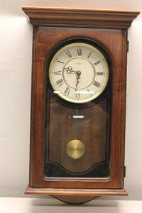 lot 92 image: Howard Miller Clock Company Westminster Battery-operated Cherry Clock