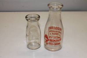 lot 99 image: Set of 2 Bridgeman Milk Containers