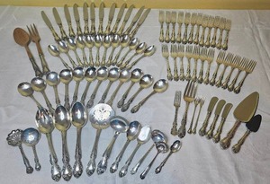 lot 1 image: Gorham Sterling Silver 12 Piece Place Setting - 94.42 Troy oz. and 41.5 oz for pieces with stainless steel blades